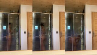 Mia Khalifa standing showering naked